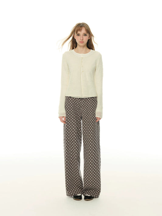 Discover the perfect blend of effortless style and practical elegance with these American Coffee Retro Polka Dot Casual Pants. Designed for the modern woman who values both fashion and functionality, these trousers feature a charming polka dot patter